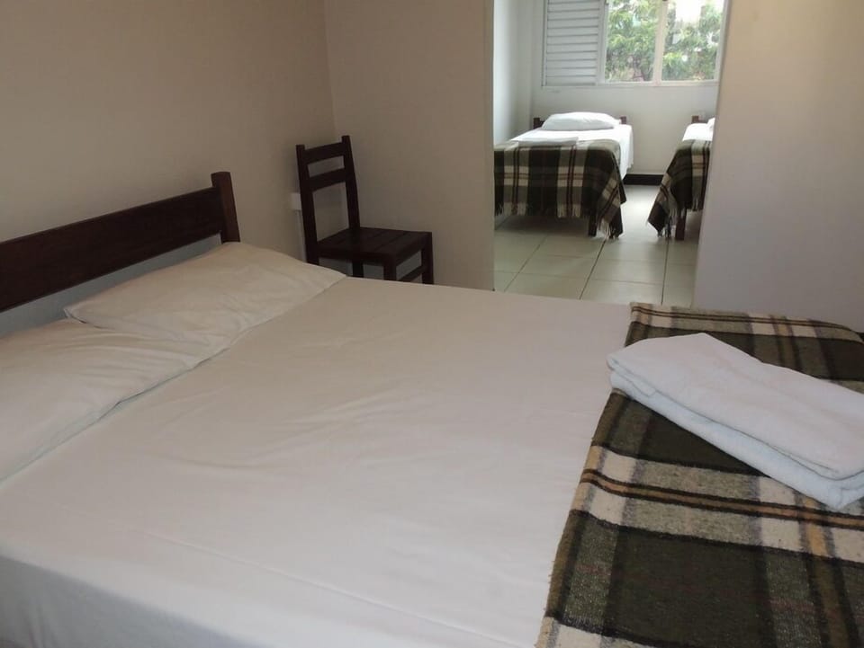 Family Triple Room | Desk, WiFi (free), bed sheets