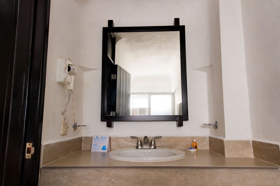 Standard Double Room, 2 Double Beds | Bathroom | Shower, free toiletries, hair dryer, towels