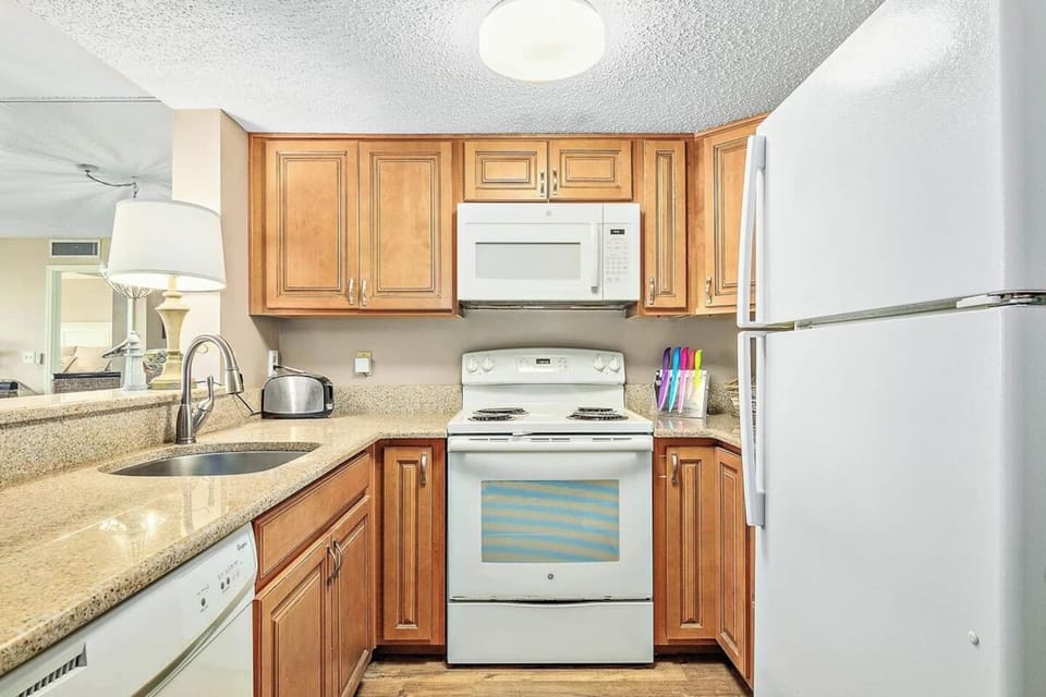 This kitchen is equipped with everything you need to cook up a delicious meal.