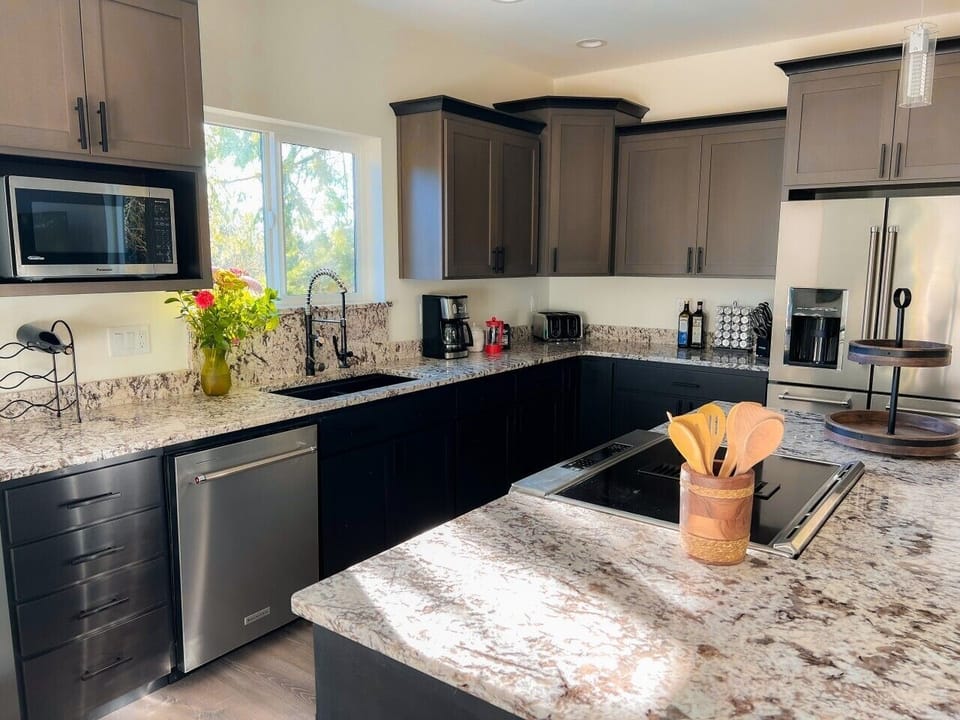 The kitchen is bright and open, ready for your creations