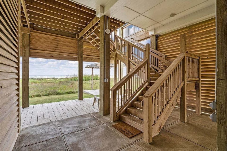 Private outdoor shower for rinsing off sand after beach days along the Galveston shoreline.