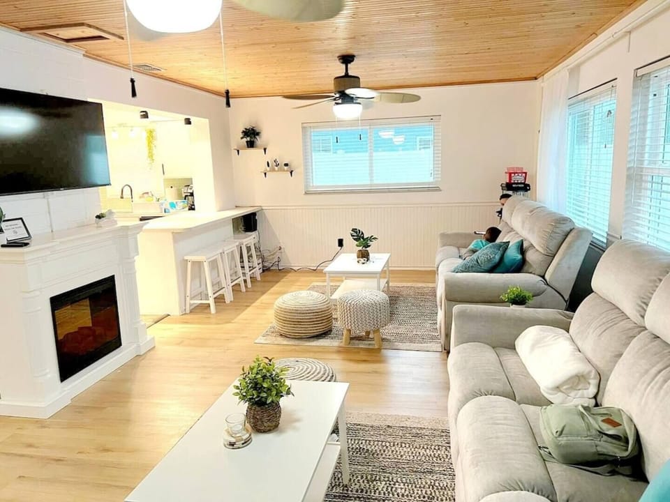 Living room . 2 Haverty recliner couch, electric fire place