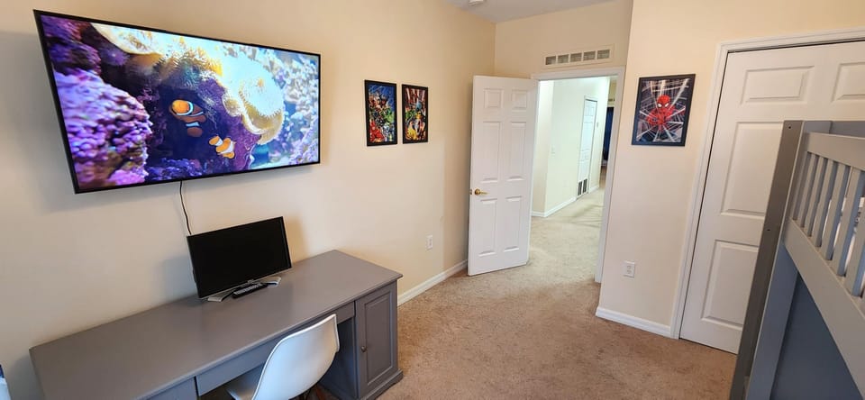 Room 2 - Fun space with bunk bed that sleeps 3.  Smart TV, desk and monitor.