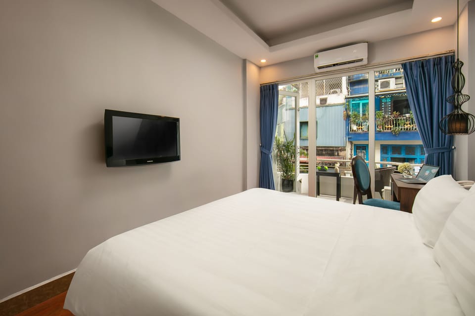 Deluxe Double Room, Balcony | Minibar, iron/ironing board, free WiFi, bed sheets
