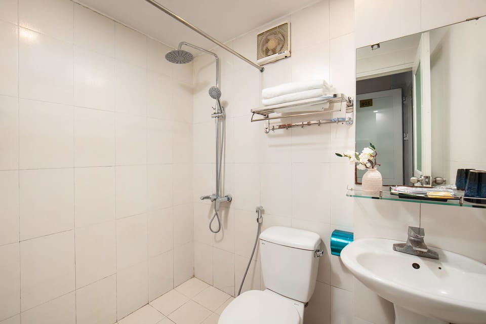 Shower, free toiletries, hair dryer, slippers