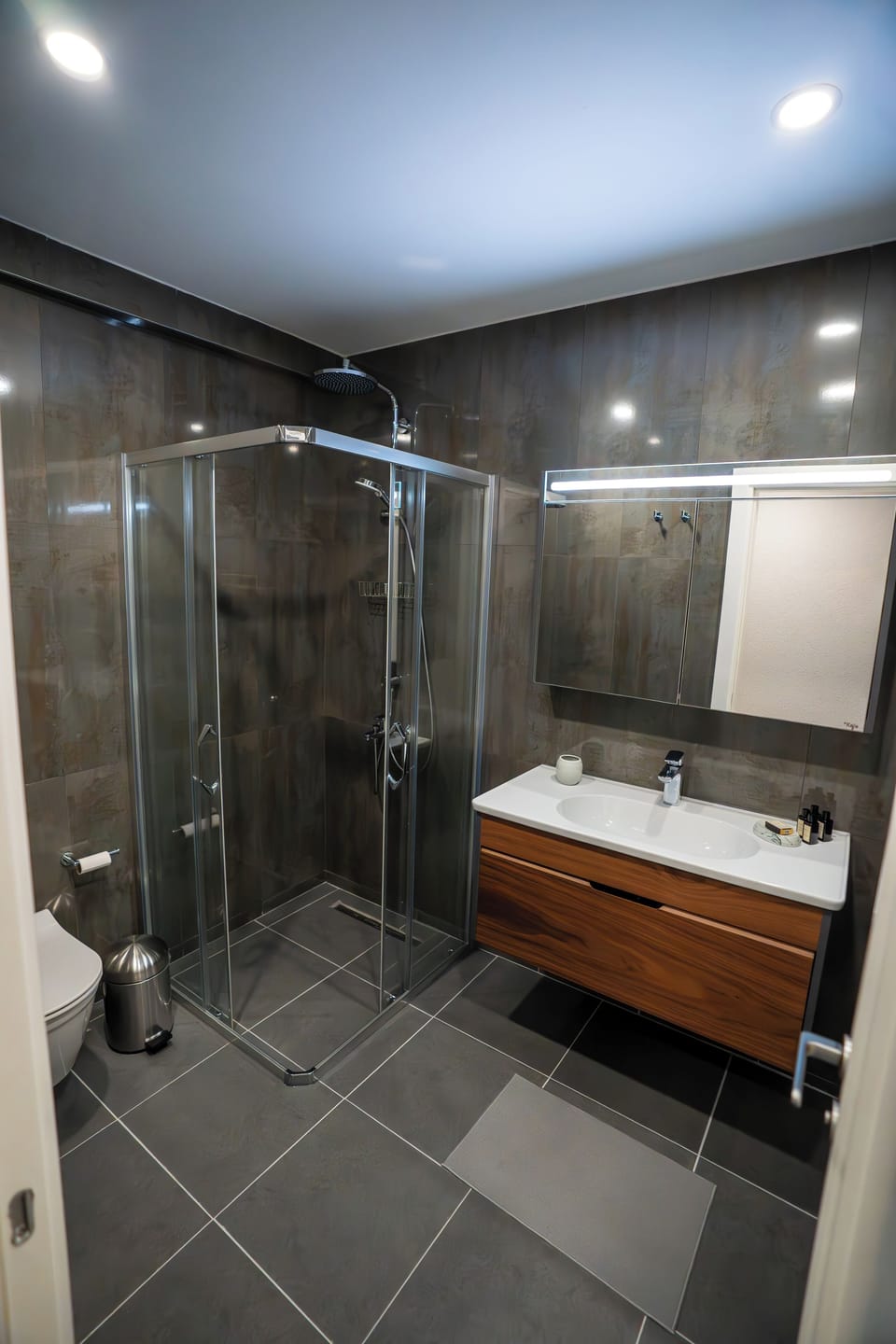Comfort Room, Basement floor with balcony, Non Smoking | Bathroom | Shower, rainfall showerhead, free toiletries, hair dryer
