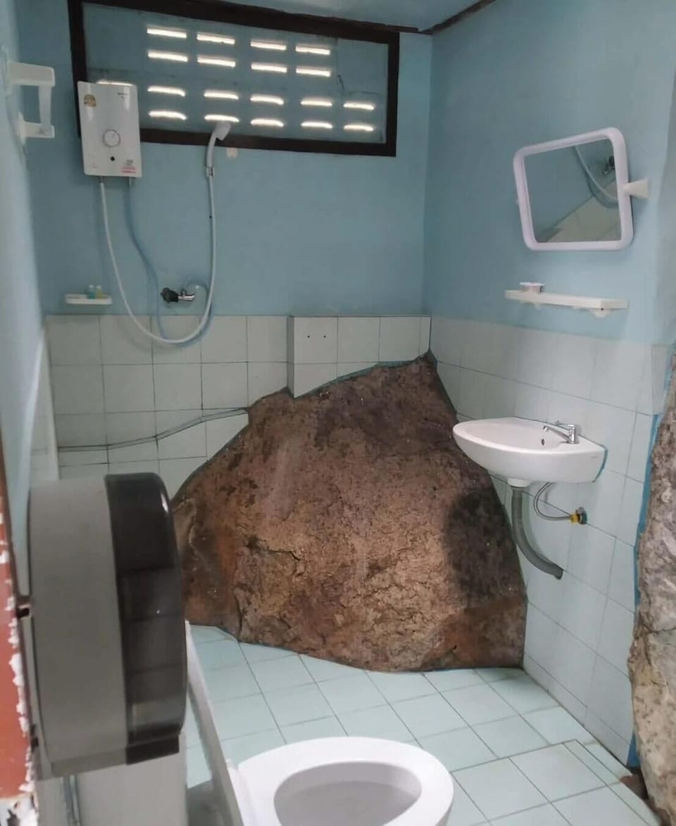 Bungalow, Sea View, Double Room, 2 Pax (Fan room) | Bathroom | Shower, rainfall showerhead, towels, soap