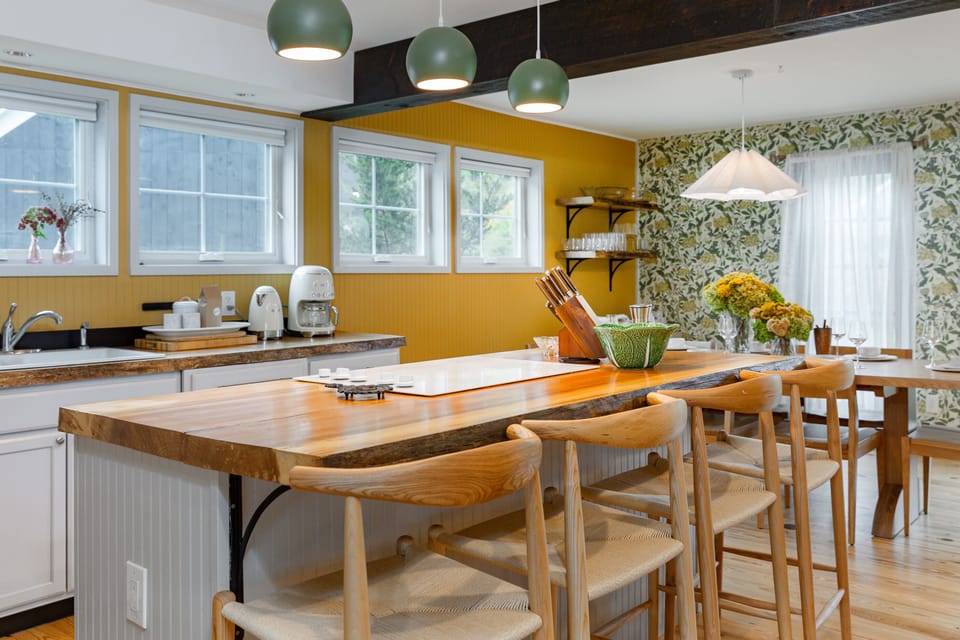 Colorful kitchen stocked with all of the essentials. 