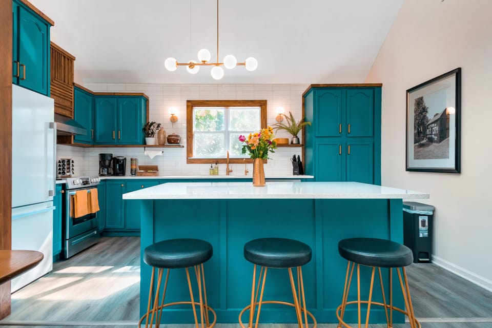 Designed for hosting, this beautiful kitchen is stocked with everything you need