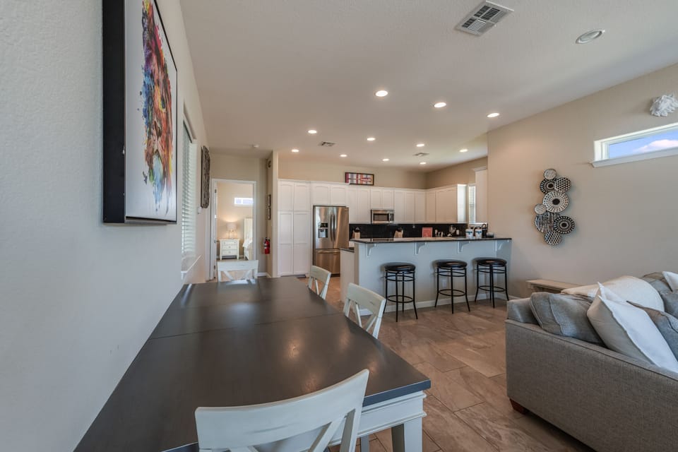 Gather around your spacious dining table while the chef works in your fully-equipped kitchen with breakfast bar seating.