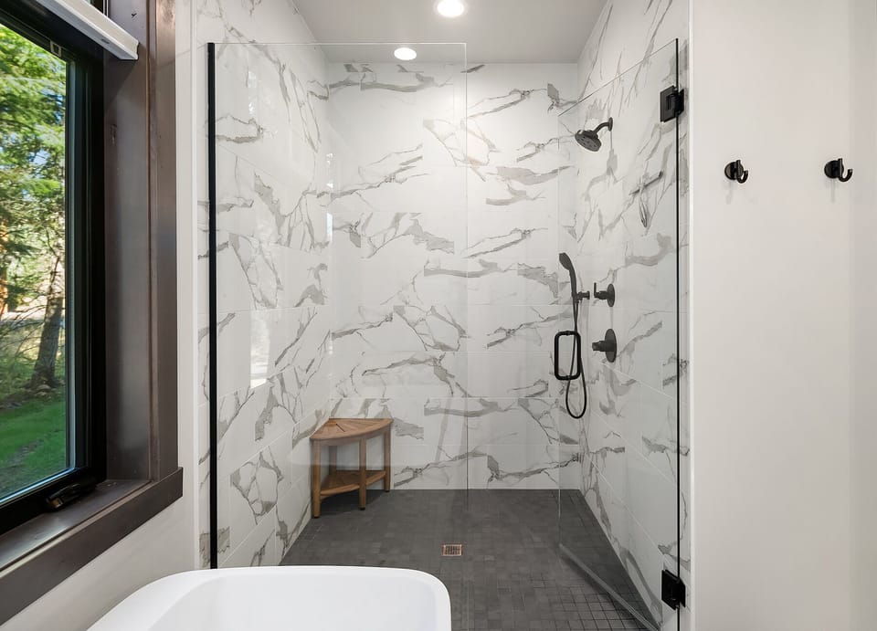 Pura Vida: - Huge walk-in tile shower.