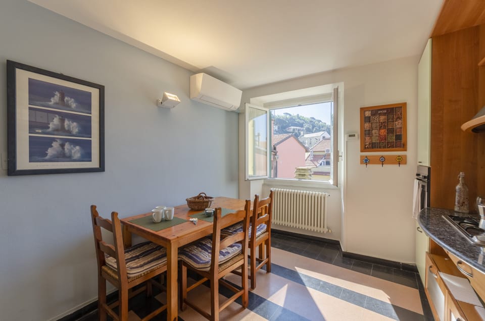 Apartment | Private kitchen | Fridge, cookware/dishes/utensils, dining tables