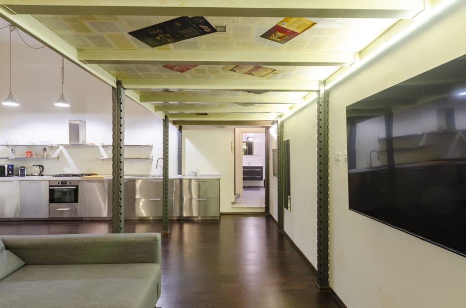 Apartment, 2 Bedrooms | Living area | 32-inch Smart TV with cable channels, TV