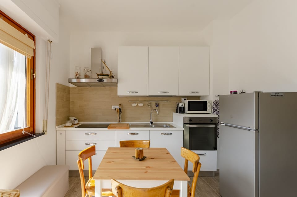Apartment | Private kitchen | Espresso maker, coffee/tea maker, electric kettle, dining tables