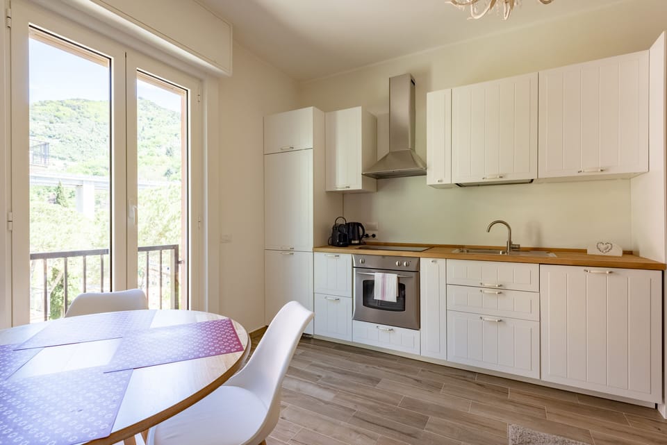 Apartment, 2 Bedrooms, Balcony | Private kitchen | Espresso maker, dining tables