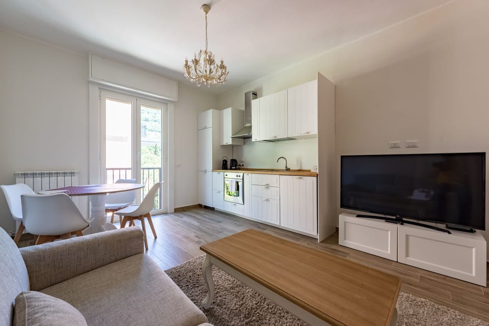 Apartment, 2 Bedrooms, Balcony | Living area | 32-inch flat-screen TV with cable channels, TV
