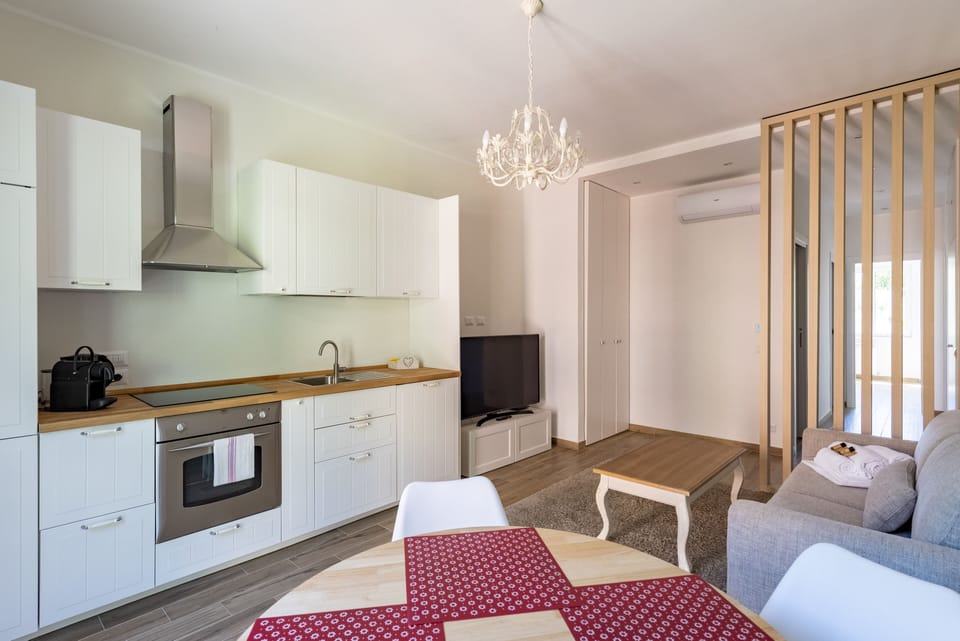 Apartment, 2 Bedrooms, Balcony | Private kitchen | Espresso maker, dining tables