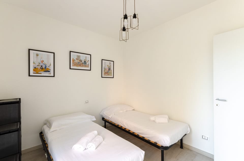 Apartment, 2 Bedrooms, Patio | 2 bedrooms, desk, laptop workspace, blackout drapes