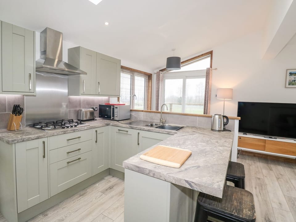 Cottage | Private kitchen | Fridge, dishwasher, electric kettle, toaster