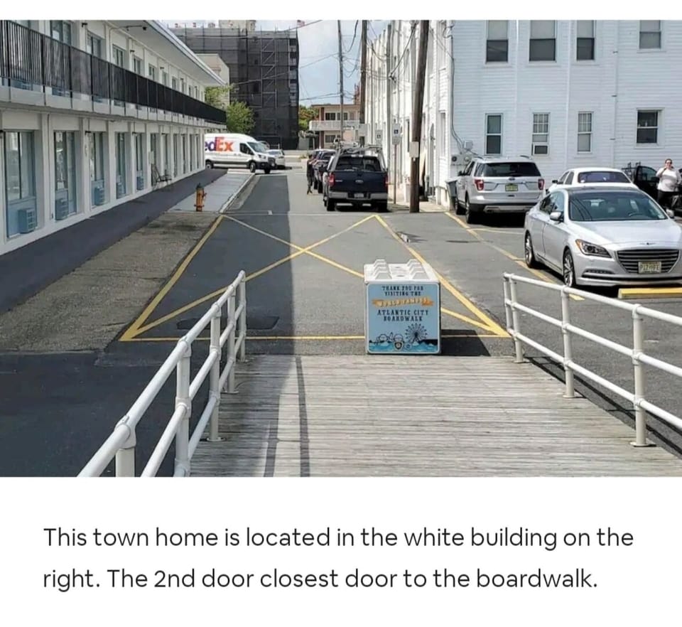 White Building on the Right... Just Steps from Boardwalk Entrance