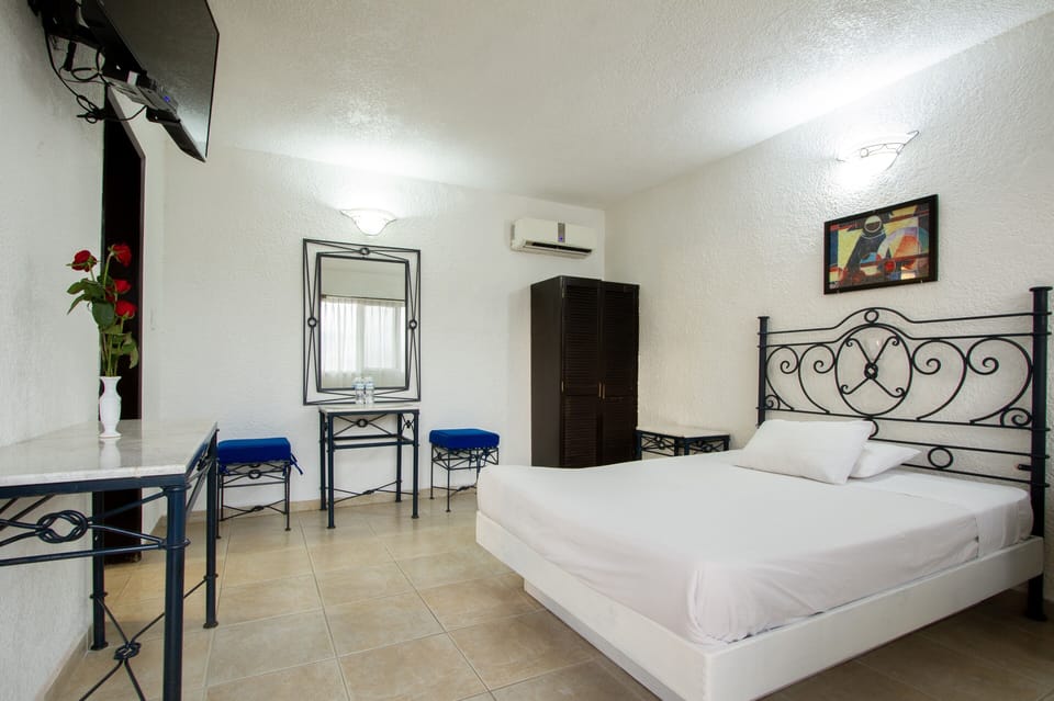 Desk, laptop workspace, free WiFi, bed sheets