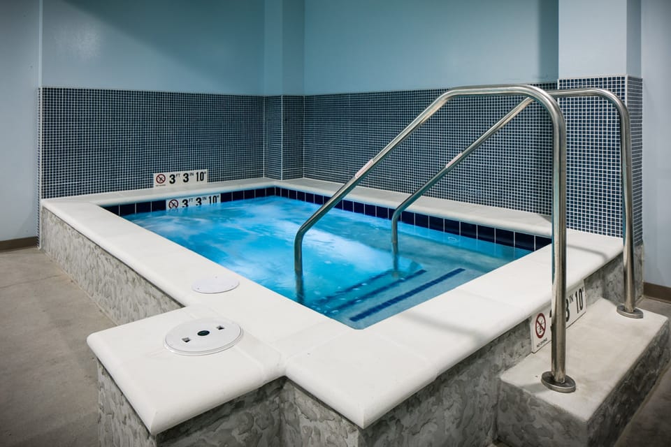 Spend time with family and friends in the indoor hot tub.