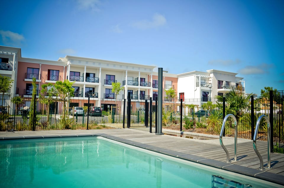 On a hot summer day, take a refreshing dip in the outdoor pool!