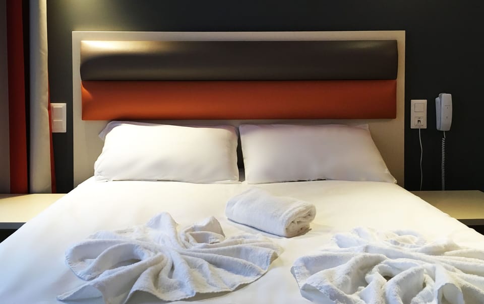 Relax on the comfy bed after a day outside.