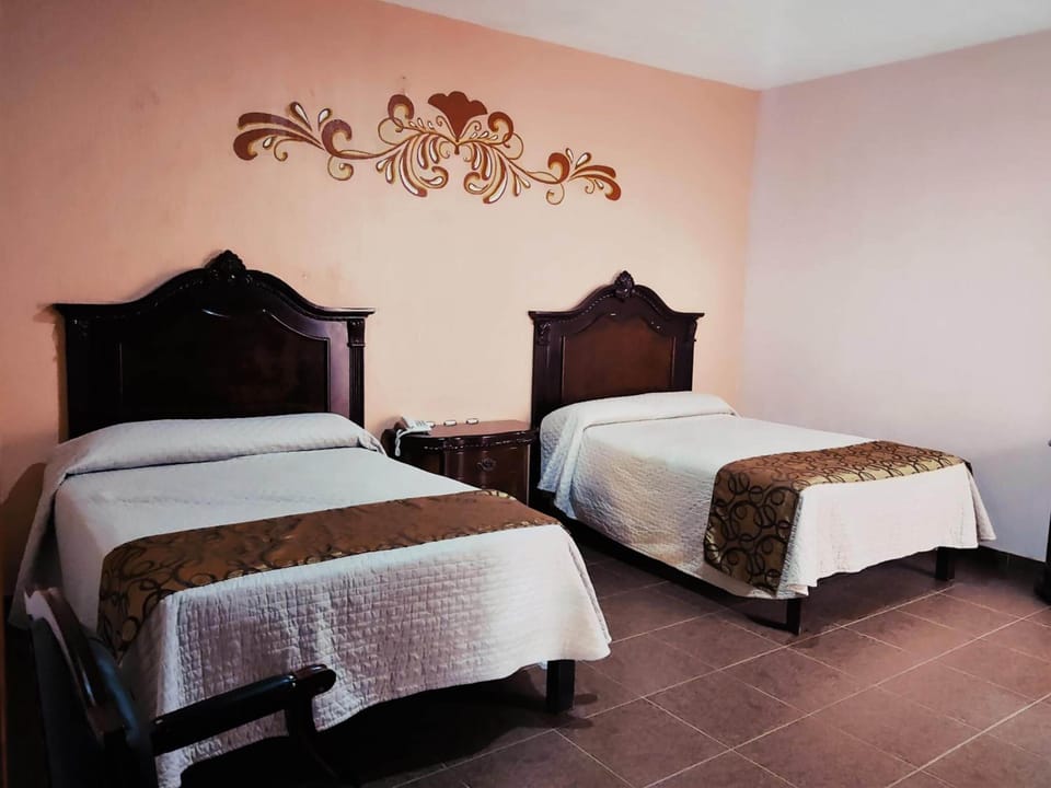 Quadruple Room | Individually furnished, iron/ironing board, free WiFi