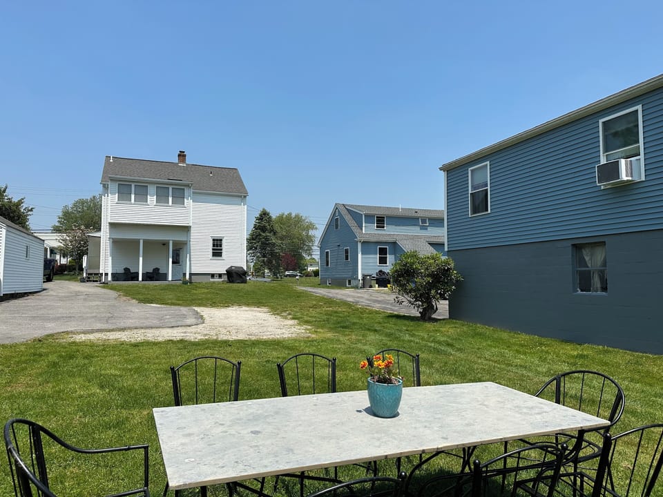Parking area & outdoor space shared with upper unit.