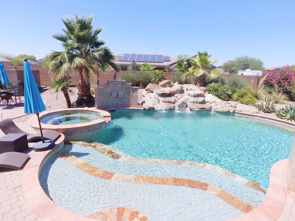 Waterfall pool with outdoor sound system