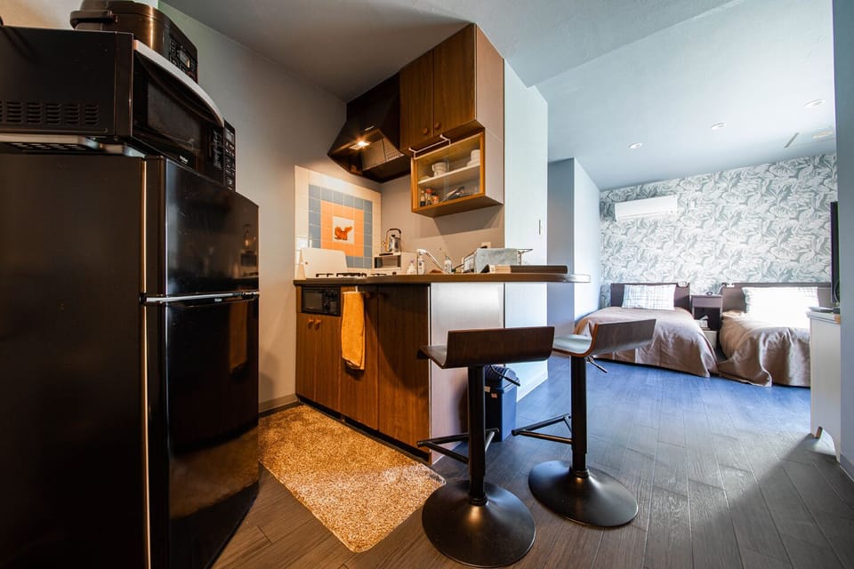 Twin Room | Blackout drapes, iron/ironing board, WiFi (free)
