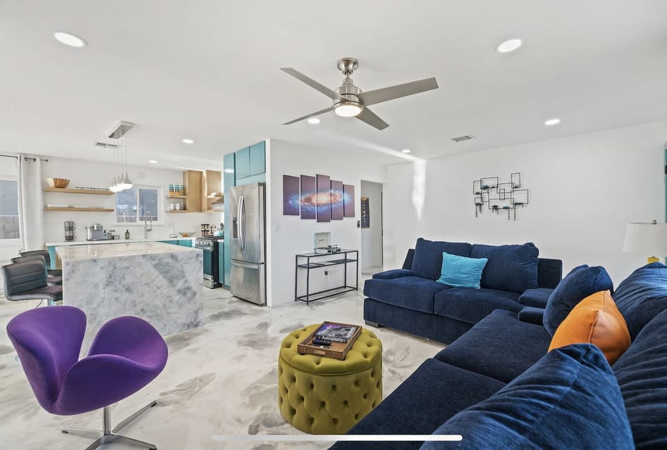 Large sofa pulls out to queen size bed.