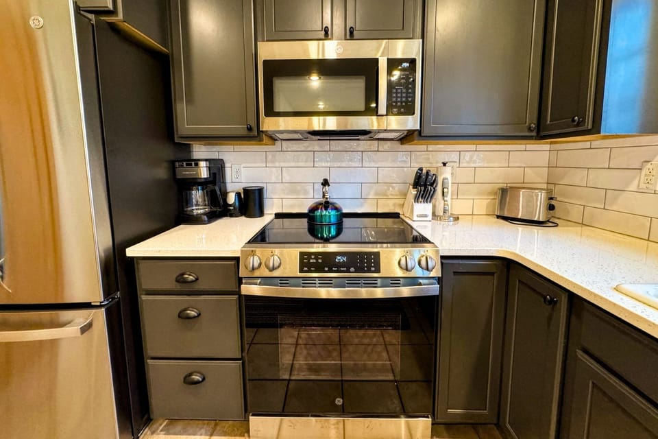 With new appliances and cabinets, this kitchen is ready for a family meal. 