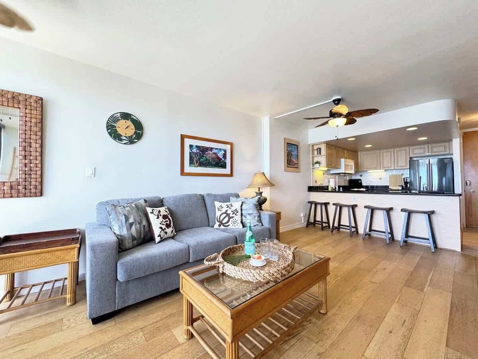 Sink into comfort on our cozy couch, perfectly positioned just steps from the dining area. It's the ideal setup for seamless relaxation and dining.