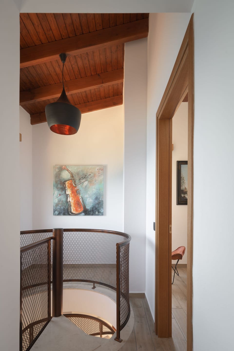 The staircase leads to the 1st floor bedrooms,.
