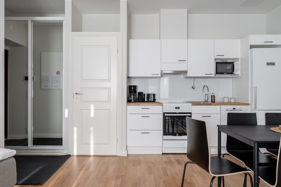 Exclusive Apartment | Private kitchen | Full-size fridge, microwave, oven, stovetop