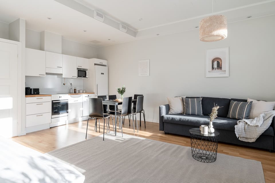 Exclusive Apartment | Living area | 42-inch Smart TV with cable channels, TV