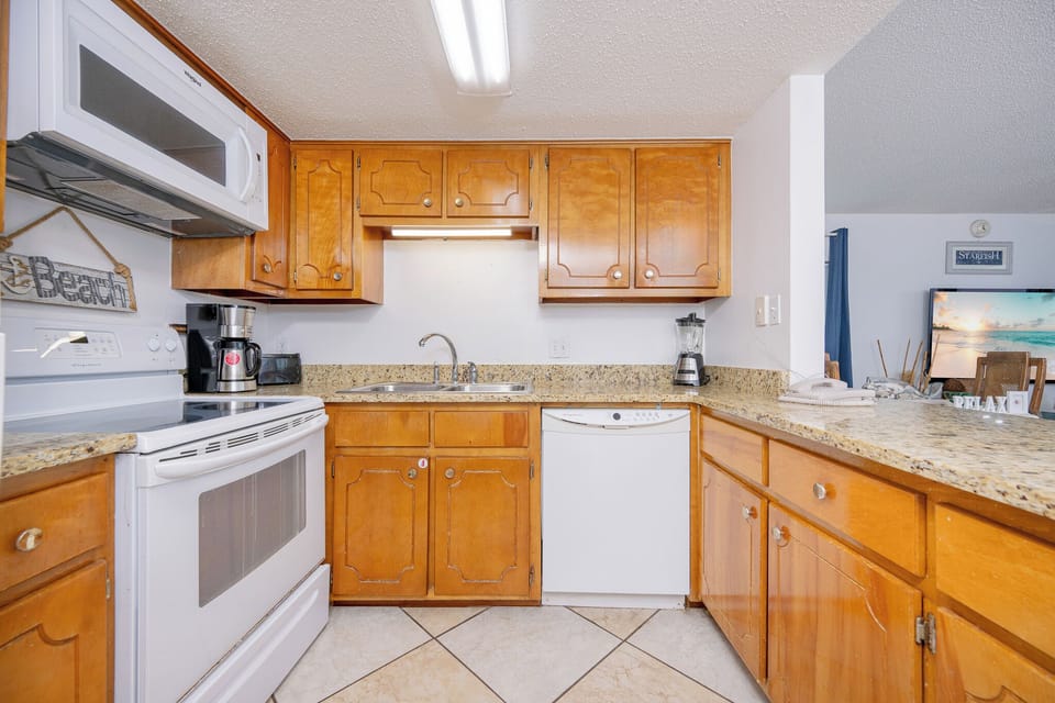 Whip up your favorite meals in the charming kitchen while taking in the inviting vibe of the surrounding space