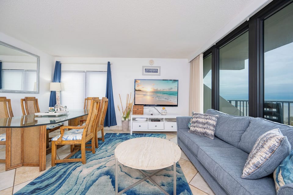 Relax on the comfortable sofa with a queen sleeper, savoring quality time as you enjoy views of the coast