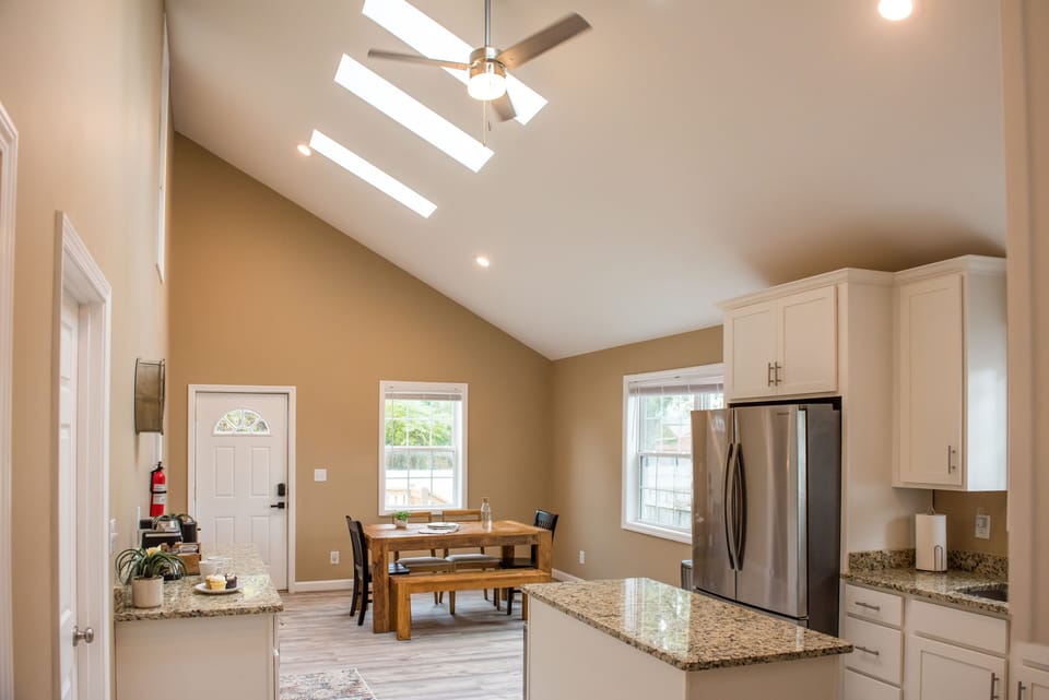 Large open kitchen with tons of natural light that floods in from the skylights.