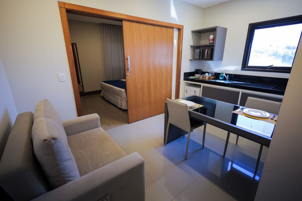 Deluxe Room (FLAT MASTER) | Minibar, in-room safe, desk, laptop workspace