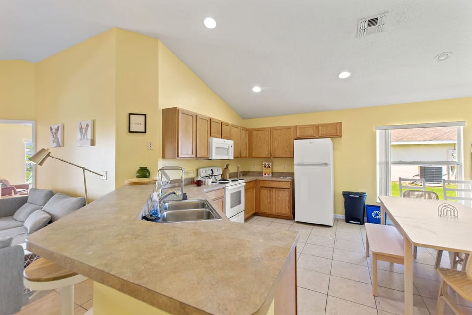 Fully-equipped kitchen with a counter bar