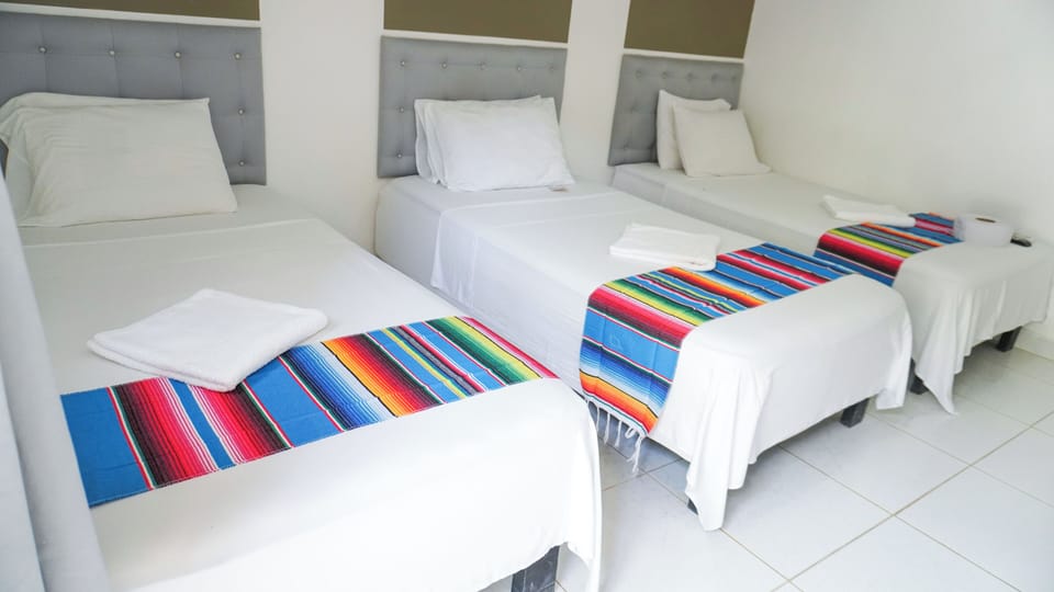 Basic Triple Room, Multiple Beds | Bed sheets