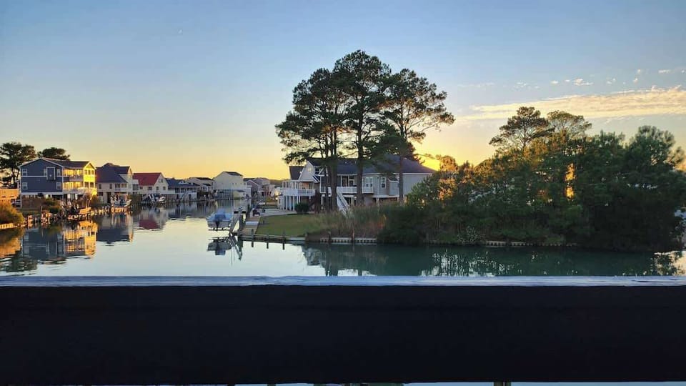 Start your day with a tranquil sunrise over the canal.