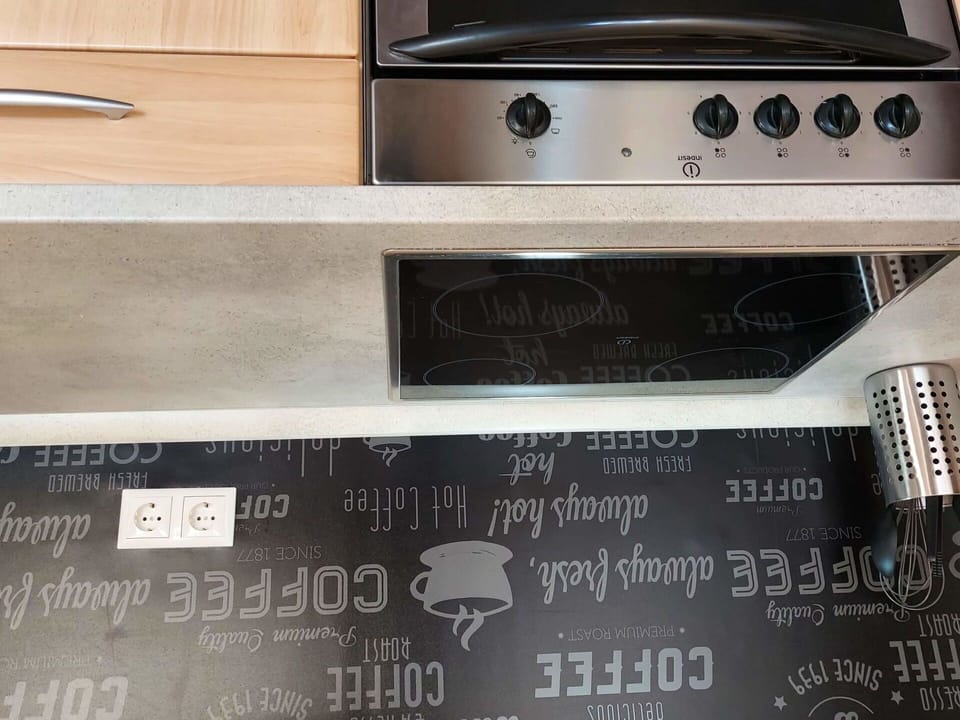 Wood, Material Property, Font, Gas, Audio Equipment, Kitchen Appliance, Home Appliance, Hardwood