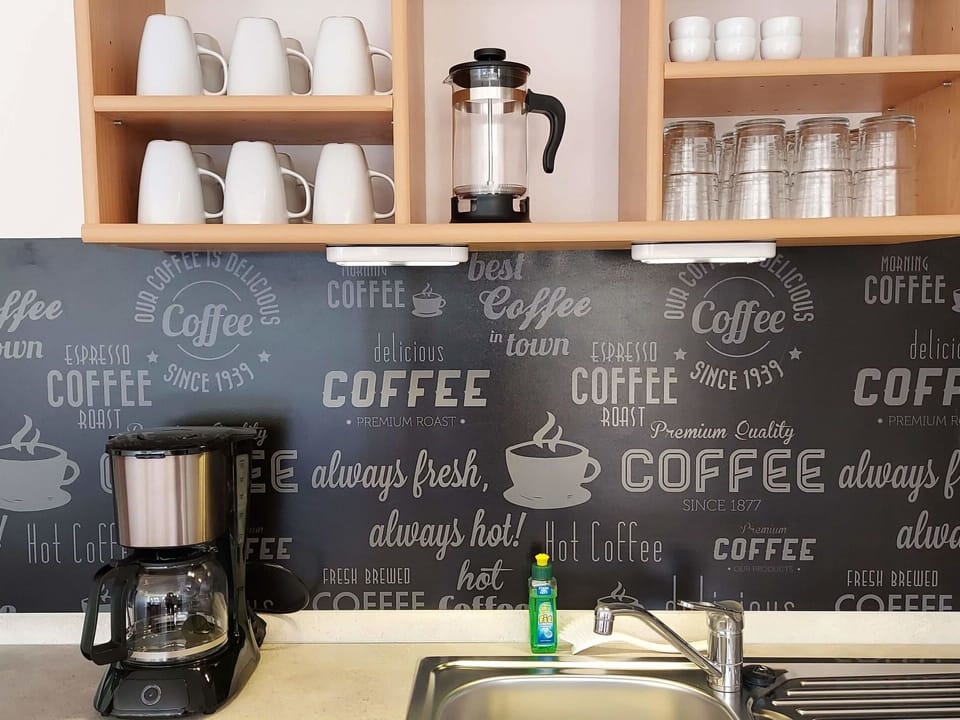 Tableware, Shelf, Drinkware, Interior Design, Barware, Shelving, Font, Wall
