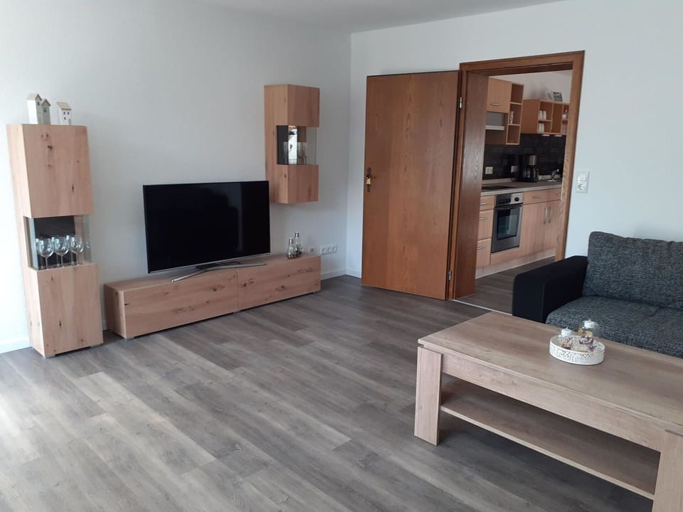 Furniture, Couch, Table, Building, Wood, Cabinetry, Interior Design, Living Room, Comfort, Flooring