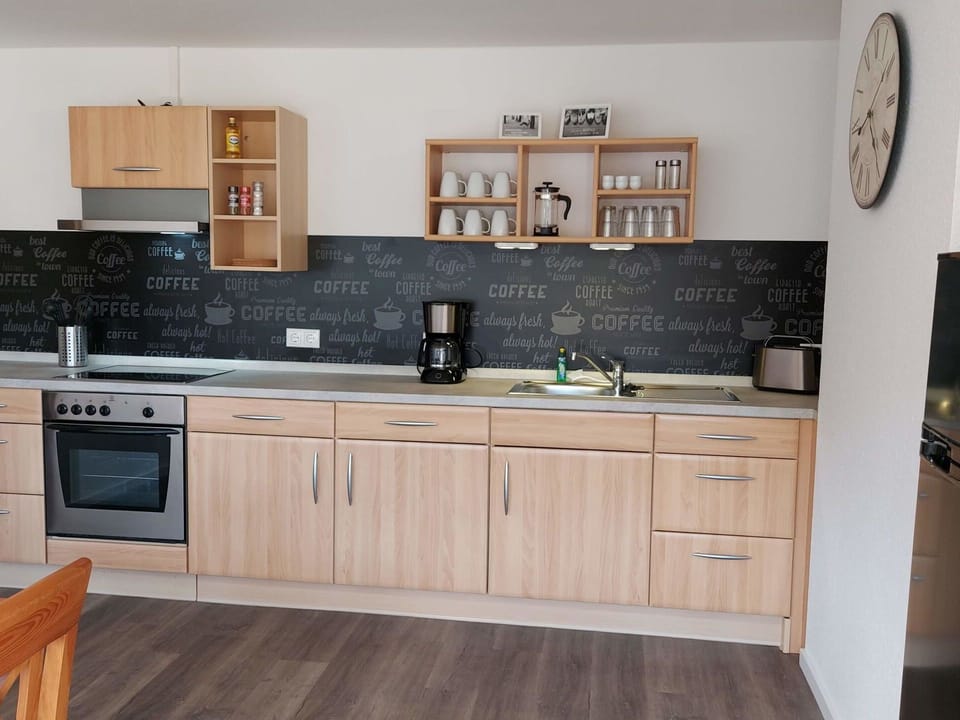 Cabinetry, Countertop, Wood, Building, Interior Design, Flooring, Floor, Kitchen, Wood Stain, Material Property