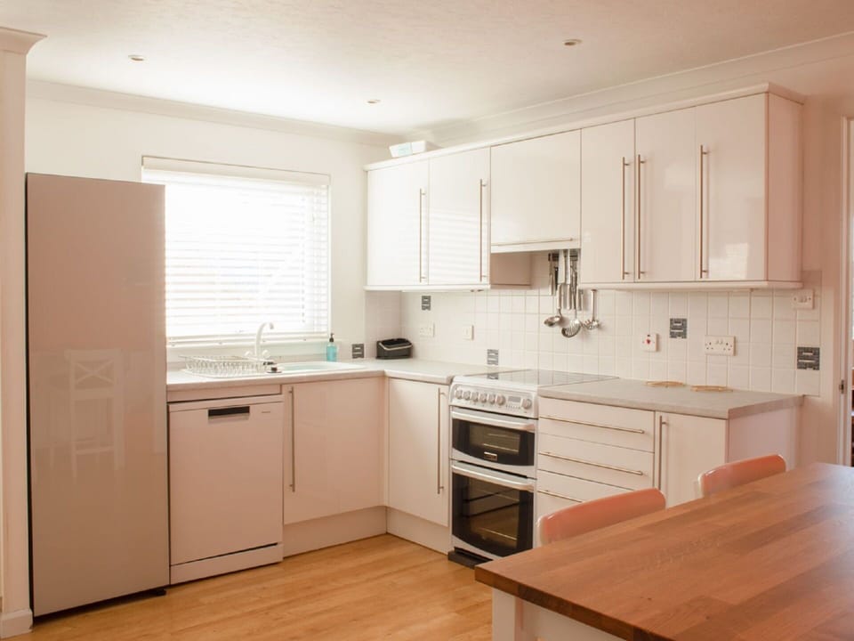 Cabinetry, Sink, Countertop, Furniture, Kitchen Sink, Kitchen, Window, Wood, Kitchen Stove, Interior Design